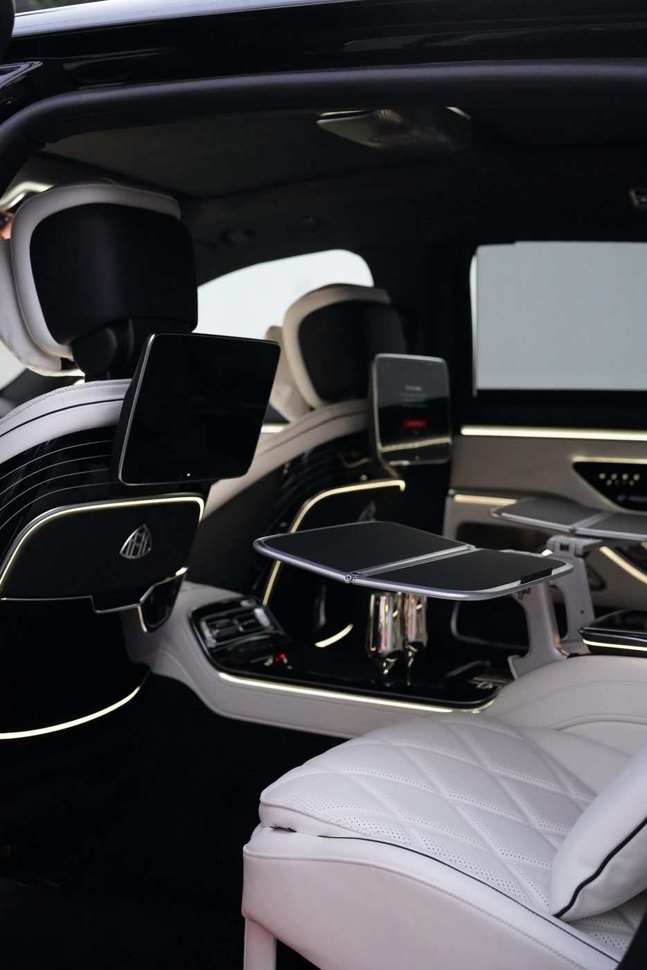 Maybach interior with reclining rear seats and tables